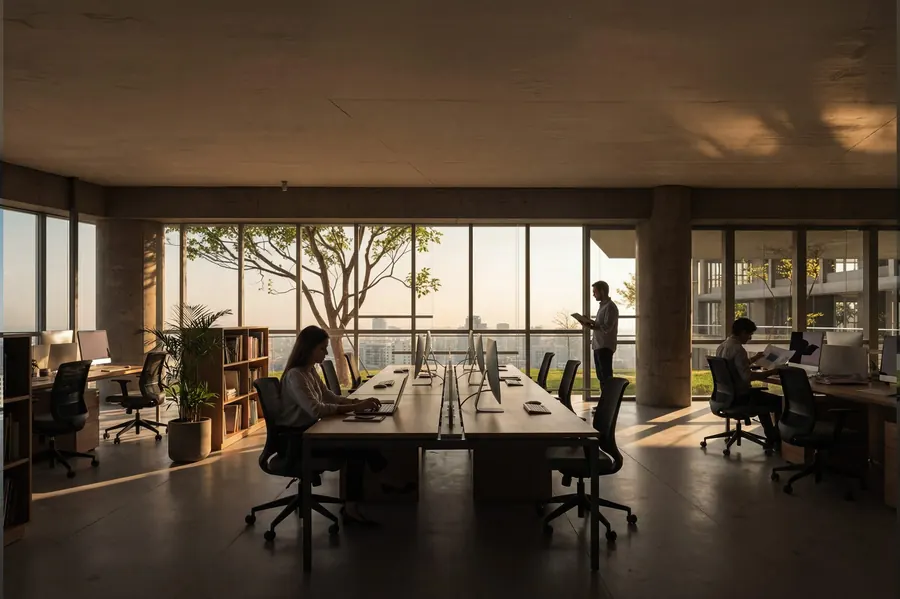 Open-plan office floor with city views